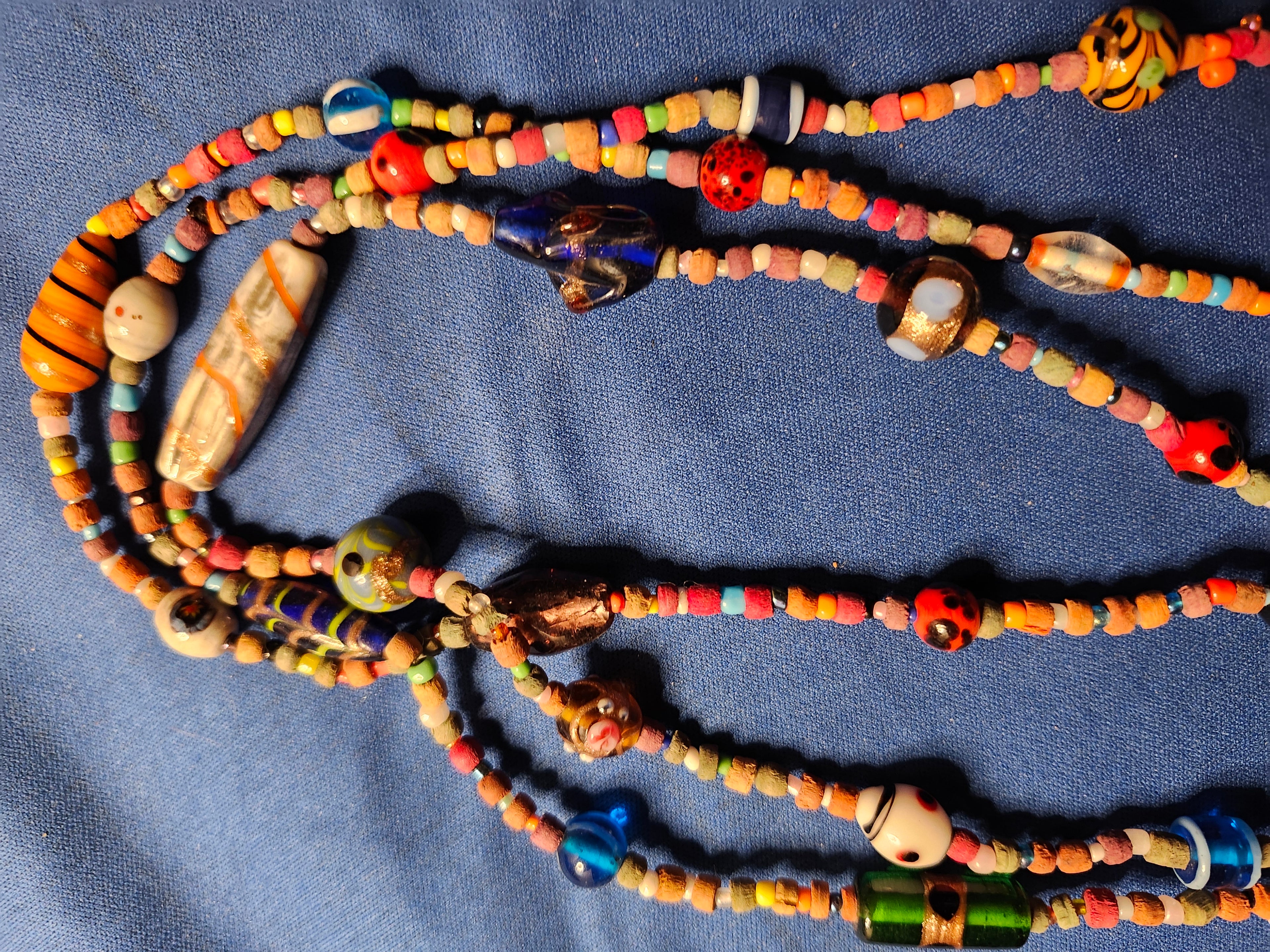 Triple strand handmade bead necklace