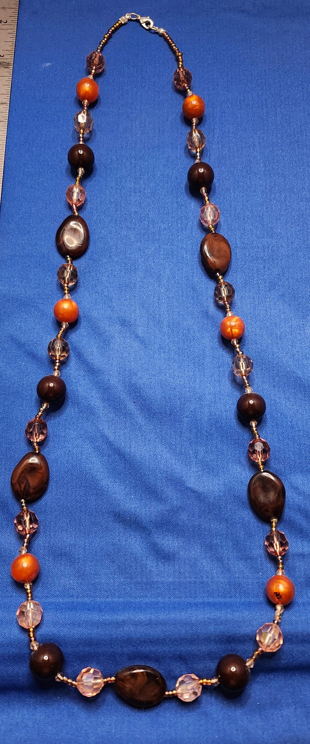 Single strand long beaded necklace