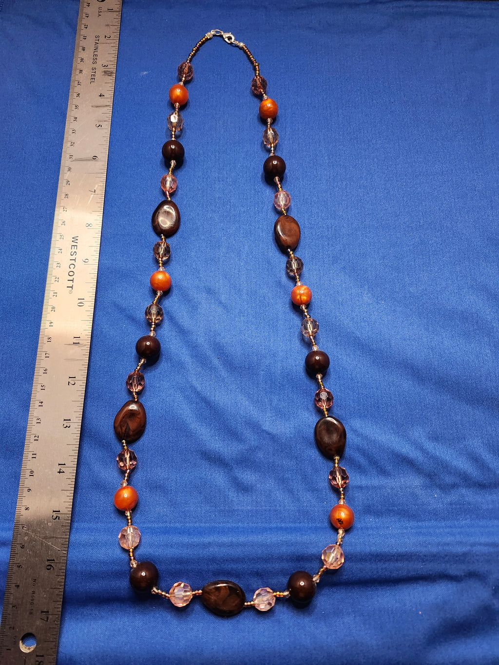 Single strand long beaded necklace